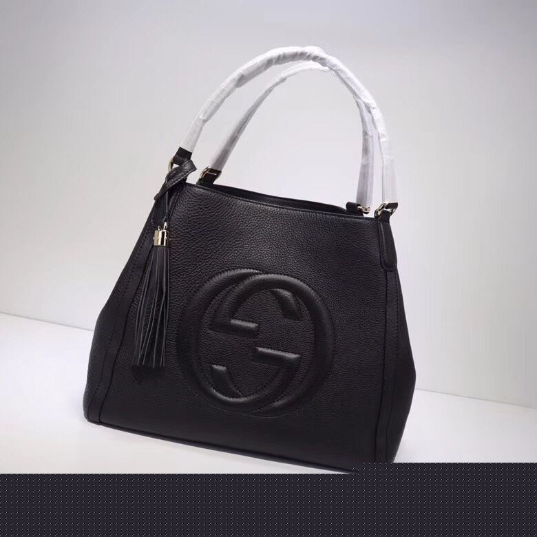 G*u*i top handle bags